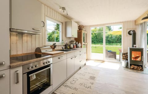 Fridge, stovetop, dishwasher, coffee/tea maker