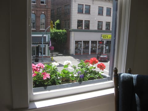Window boxes along the front of the building  (369 Court NE).  
