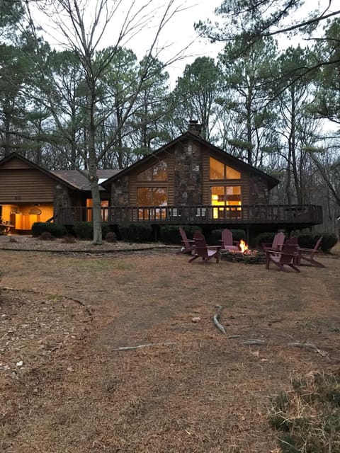 Front of the house in the evening. We recently moved the fire pit to backyard.