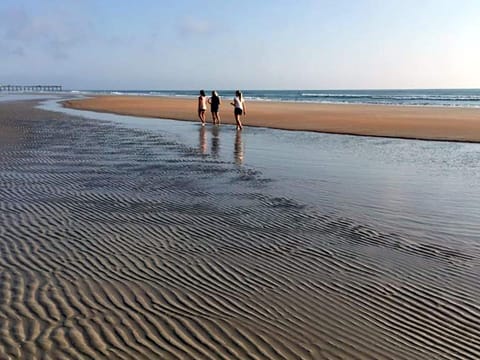 On the beach, sun loungers, beach towels