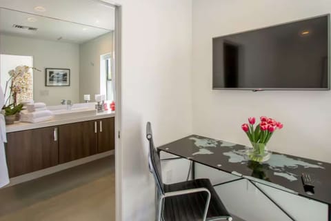Powder Room with Warhol Basquiat Art and Modern Pedestal Sink
