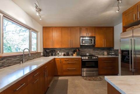 Room for many hands and a million-dollar view. My love is large drawers. Lots!