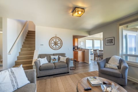 Living room - Living room has a full oceanfront view, fireplace and plenty of comfy seating along with a nice open floor plan.
