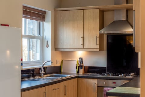 Kitchen with dishwasher, washer/drier, fridge, fridge freezer,  microwave etc