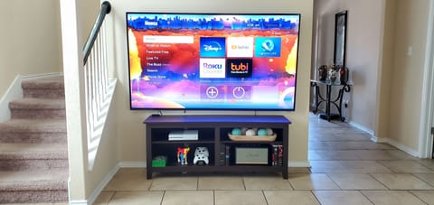 Living room with 80" Smart tv, Xbox One, and BT Stereo