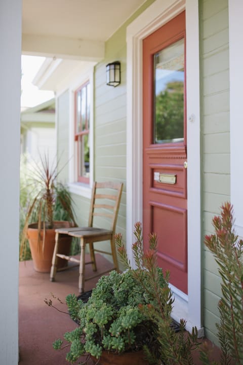 Front Porch. Steps down to garden table,. Great for morning coffee.