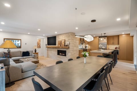 The open floor plan of this newly remodeled condo welcomes you and your travel companions to relax and embrace your getaway to Aspen!