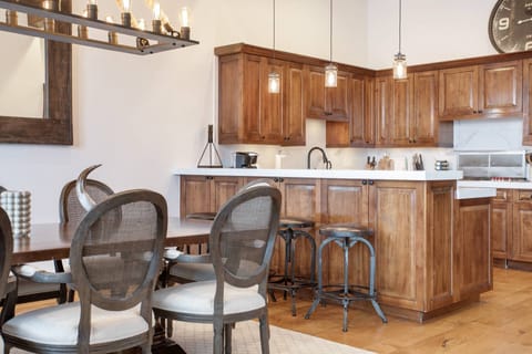 Kitchen has bar seating for 4