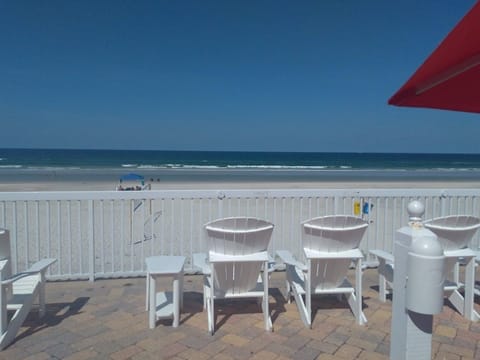 On the beach, sun loungers, beach towels