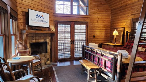 Main Level Living Area w/ Wood Burning Fireplace & King Bed