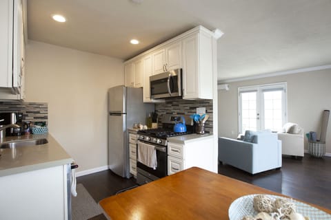 Full size kitchen with new appliances to prepare any meals