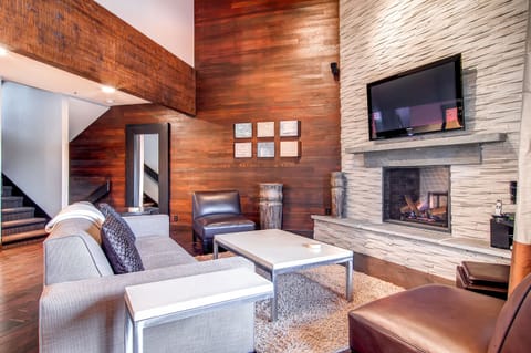 Comfortable contemporary living room gas fireplace large screen TV - Park City Lodging-Lakeside 1629