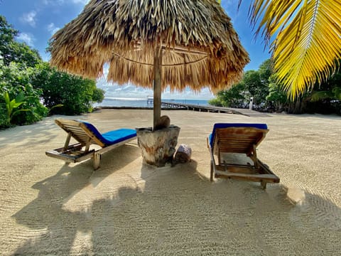 On the beach, sun loungers, beach towels