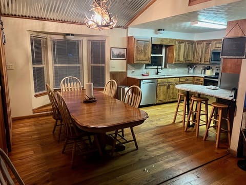 2024 remodeled Kitchen and open concept to the living room. Taken from entry

