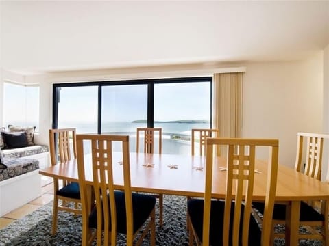 Dining room sits 10 with side sitting area,fireplace and deck with 180* views.