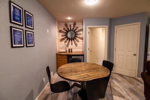 A card table and wet-bar make this the place to play or chill.