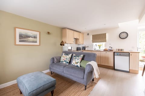 Woodman's Cottage - open plan sitting room and kitchen