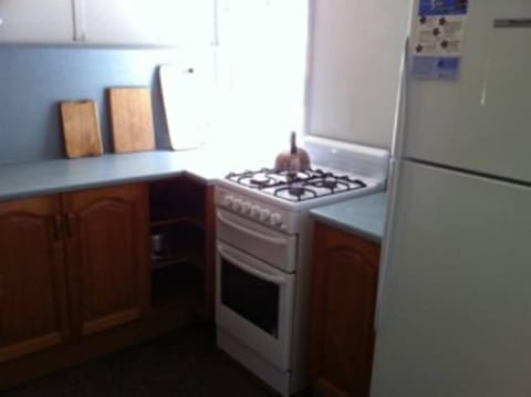 Fridge, stovetop, cookware/dishes/utensils