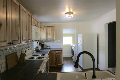 Kitchen looking into laundry room