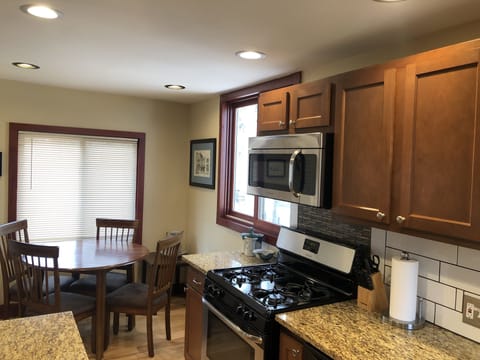 The kitchen has ample counter space and a cozy eating area for 4! 