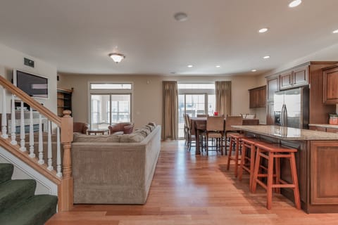 The kitchen and living room open to one another, letting the celebration flow.