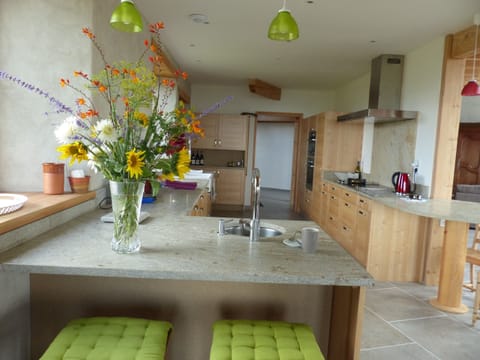 Kitchen fully equipped with plenty of working space, two sinks and all utensils