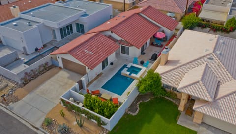 Drone pictures from up above with view of patio layout that is very private.