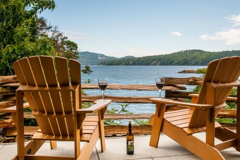 Kick back on your private patio. You can't get much closer to the water!