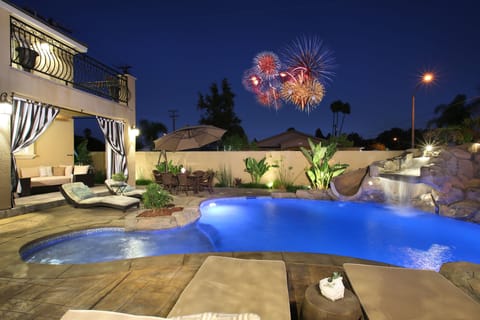 Backyard with close view of fireworks display