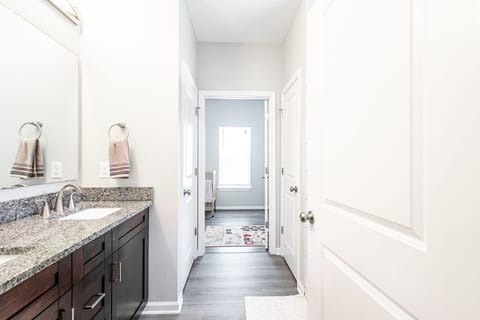 Combined shower/tub, hair dryer, towels, soap