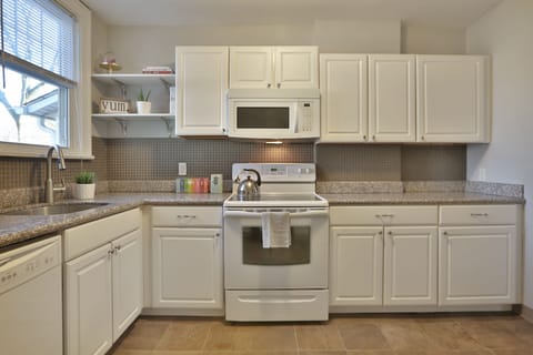 Fully stocked kitchen with everything you might need to host a holiday meal.