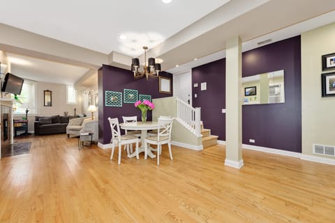 Large kitchen with open floor plan, hardwood floor throughout.