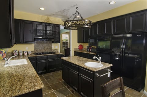 View of Kitchen Adjacent to Formal Separate Dining  Room with Seating for 6!