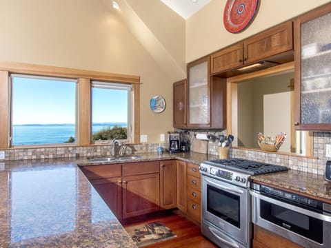 Prepare meals in the kitchen and enjoy the gorgeous view