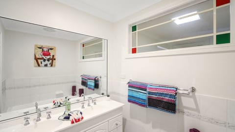 Combined shower/tub, hair dryer, towels, soap