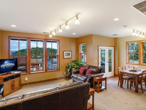 The open concept kitchen, living and dining room all have nice views of the ferry landing in Friday Harbor.