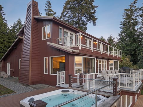 Each floor of this home features its own private balcony. The main floor balcony leads to the barbecue area.