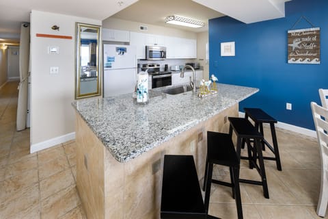 Kitchen - All appliances, cookware, cutlery, small electronics, and other basics provided and stocked in the kitchen for all your cooking needs.