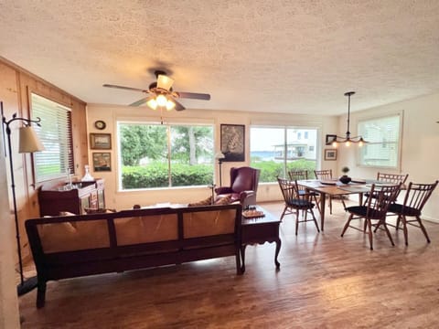 Dining room/bay room. Overlooks yard and bay. Has door to outside dog area.
