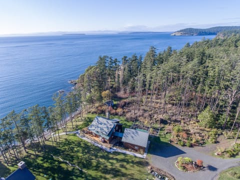 Enjoy this beautiful home with waterfront views.
*A neighboring house has since been built on the other side of this home.*