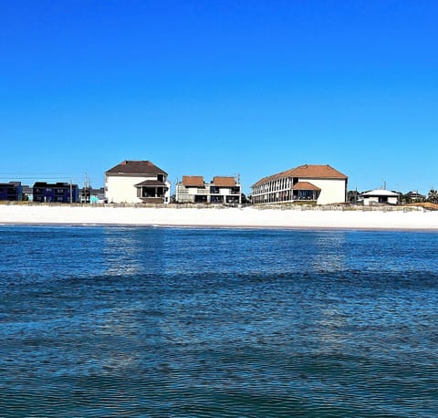 On the beach, sun loungers, beach towels