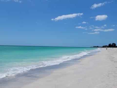 Beach nearby, beach umbrellas, beach towels