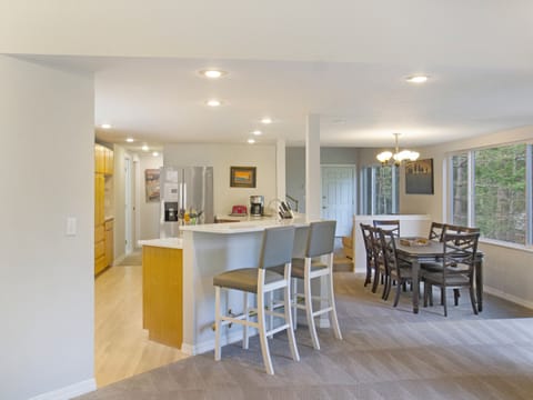 Sunken dining room located off of the kitchen and living room.
