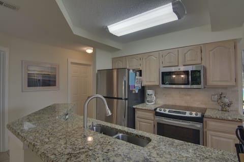 kitchen with granite & ss appliance
