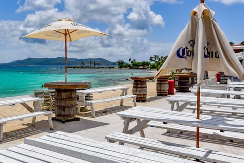 On the beach, sun loungers, beach towels