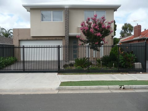 Front Entrance with secure remote sliding gate