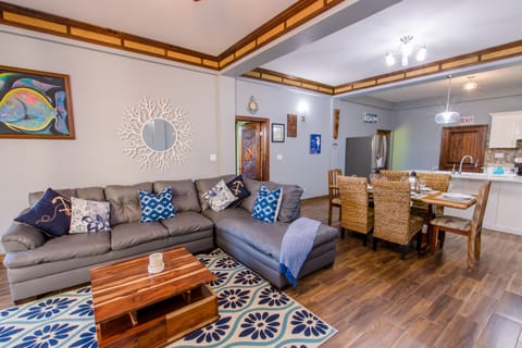 Living Area with 42' TV and floor to ceiling glass doors 