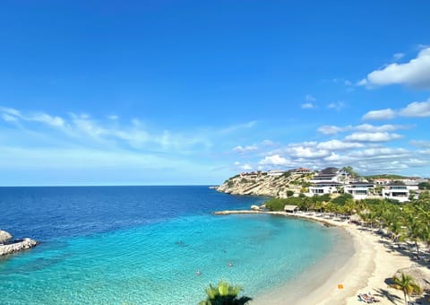 On the beach, sun loungers, beach towels