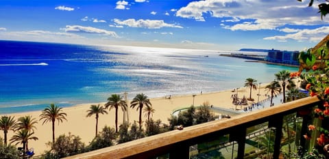 On the beach, sun loungers, beach towels