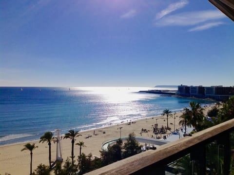 On the beach, sun loungers, beach towels